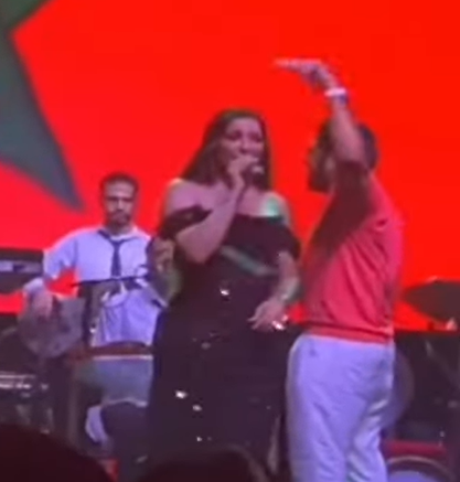 فيديو دنيا بطمة تتحول إلى راقصة تحت الدولارات